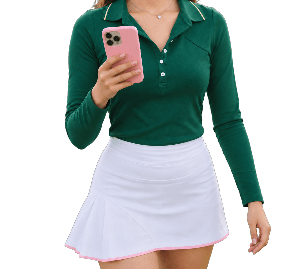Woman in a green golf top holding a pink phone