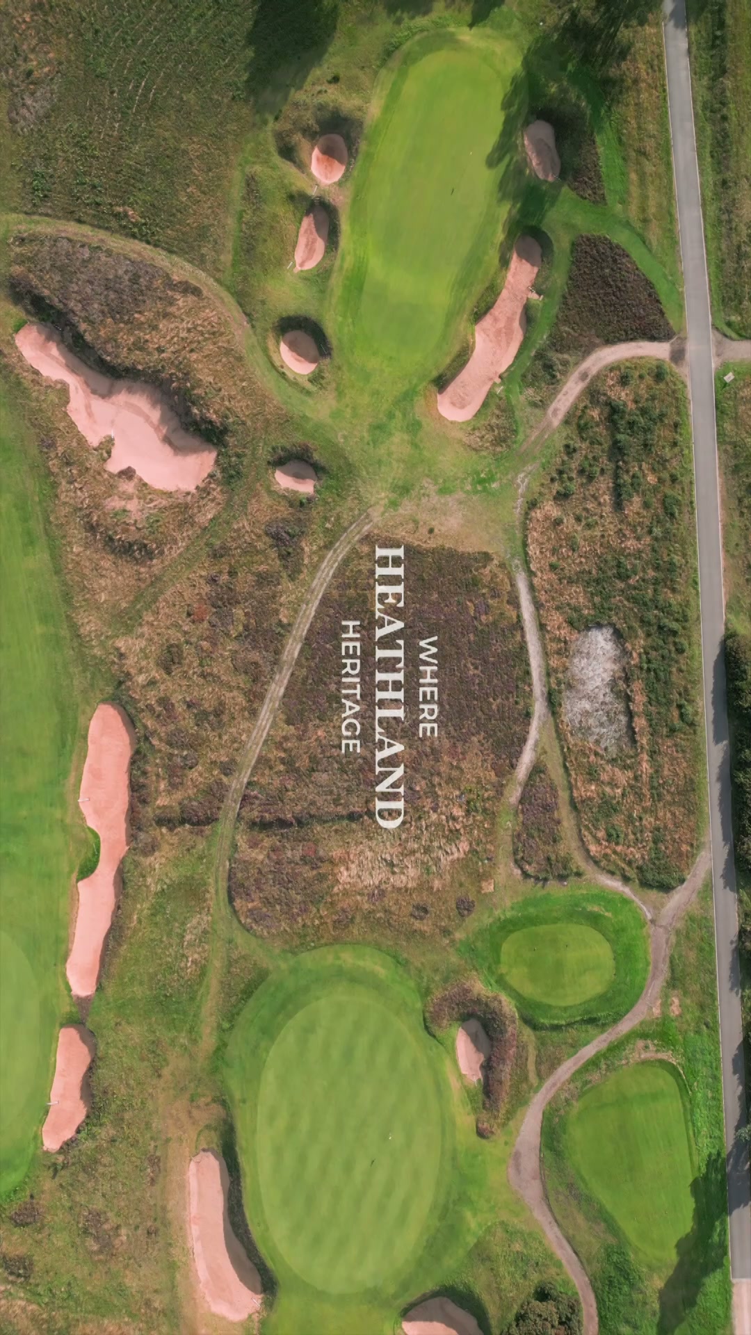 Overhead film view of heathland greens and bunkers at Woodhall Spa.